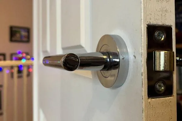 Lever handle and latch lock fitted to an internal door in Higham Ferrers.