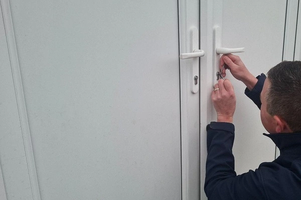 Residential locksmith opening a failed lock