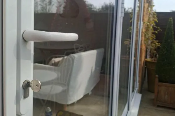 Cylinder lock and handle fitted to a patio door in Higham Ferrers.