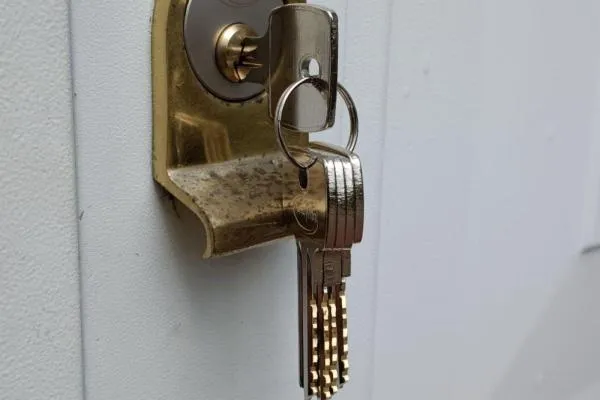 Lock change in Raunds by The Parish Locksmith, replacing a worn wooden door lock to restore reliable security.