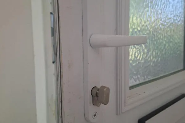 Lock fitting in Earls Barton by The Parish Locksmith, installing a new lock to a uPVC door to improve security and reliable operation.
