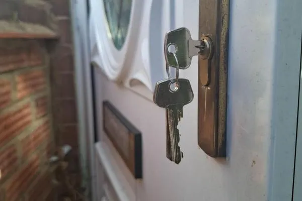 Keys in a replacement front door lock fitted in Irthlingborough.