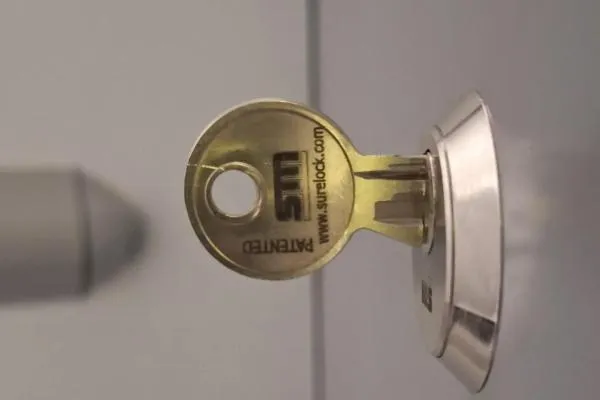 Suited key inserted into a lock cylinder as part of a master key system
