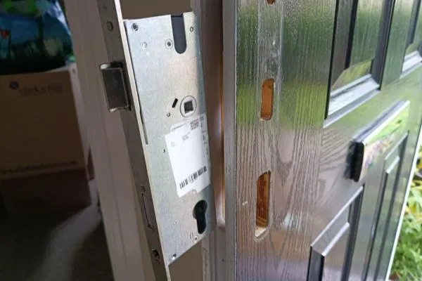Raunds locksmith repairing a multipoint locking mechanism on a composite door.