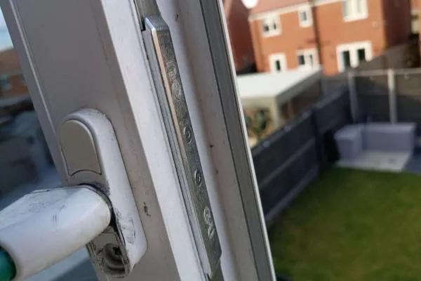 uPVC window repair in Raunds involving a faulty handle and locking mechanism.
