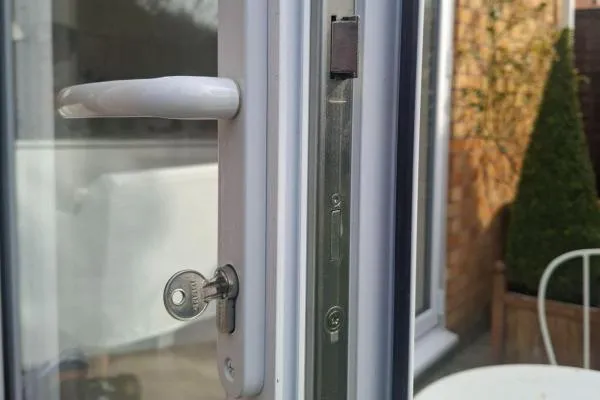 Key in a uPVC patio door lock showing the multipoint locking mechanism in Wellingborough