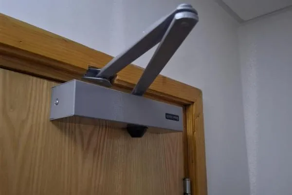 Door repair in Sharnbrook involving an overhead door closer