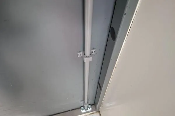 Fire exit door hardware installation on a commercial door