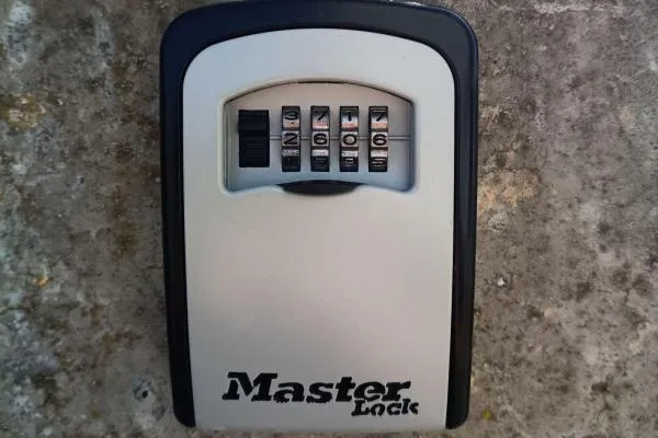 Key safe installation for secure residential property access