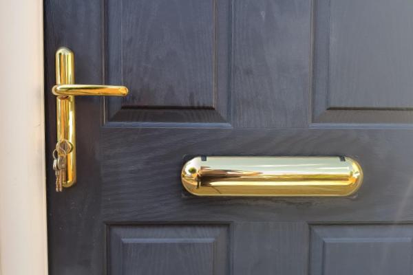 Letterplate fitted to a residential entrance door