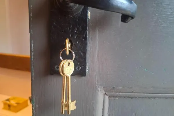 Locksmith in Great Harrowden replacing a mortice sashlock on a door