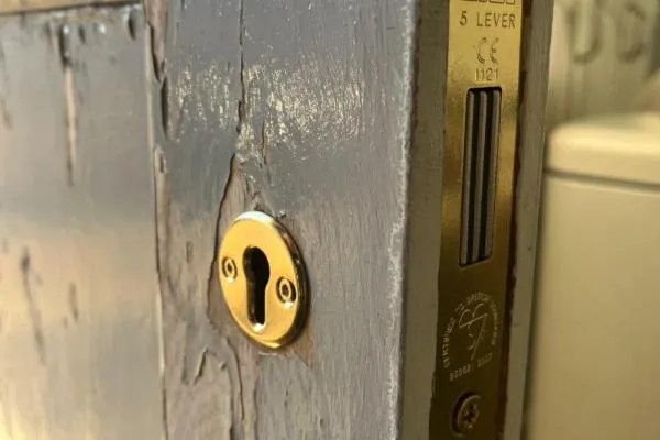 Five-lever mortice deadlock fitted to a wooden door, illustrating lock installation services in Castle Ashby.